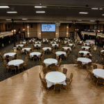 meeting space with chairs and round tables