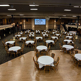 meeting space with chairs and round tables